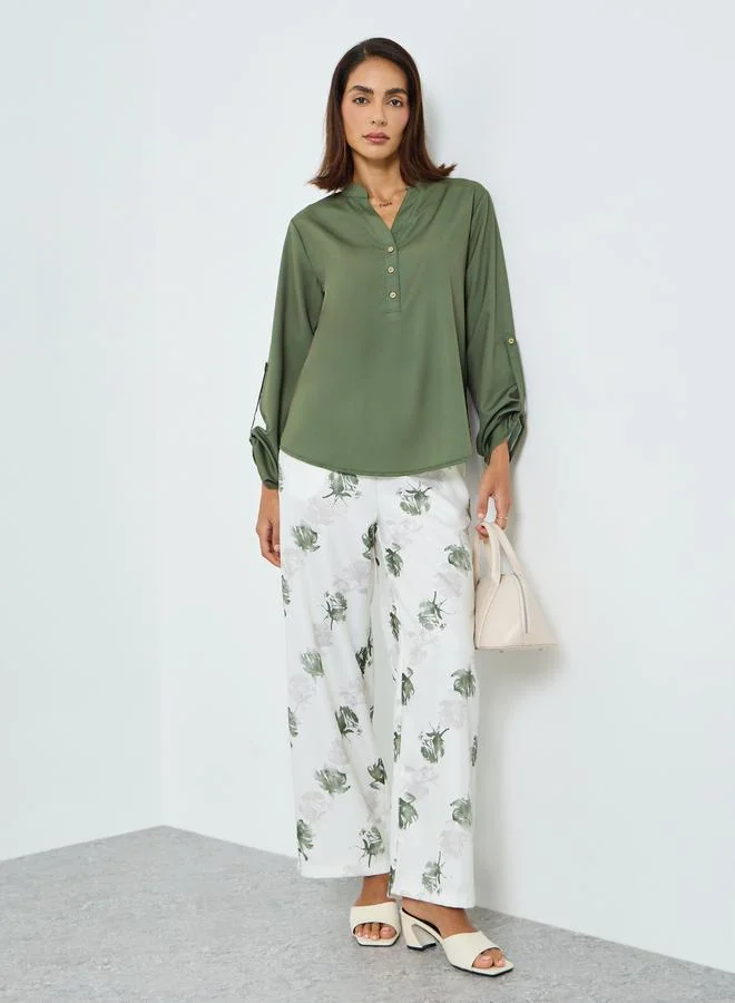 تايك تو طقم بلوزة بأكمام قابلة للطي وبنطلون مطبوع بزهور